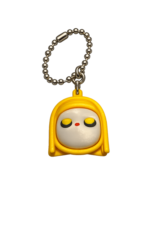 Keychain with a cartoon character in a yellow hood on a white background