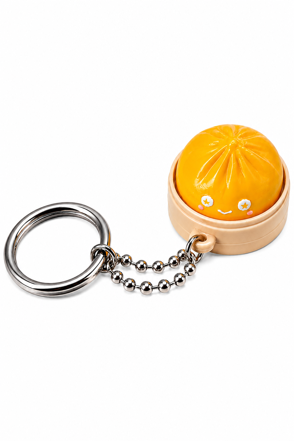 Keychain with a lemon-shaped object on a white background